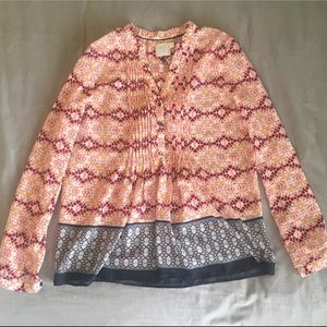 HD in Paris tunic blouse sold at Anthropologie